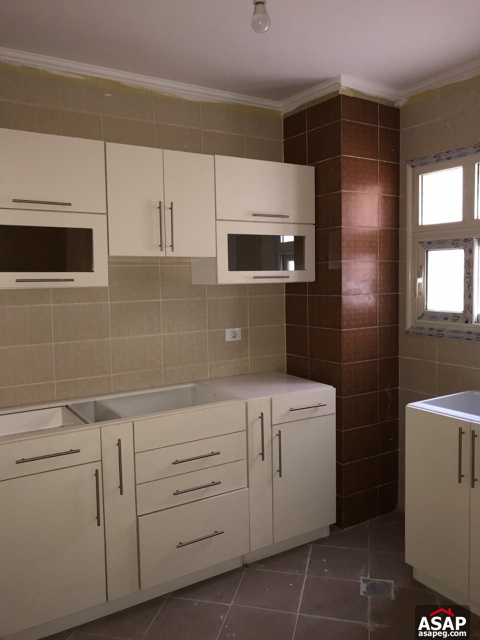 Apartment with Kitchen for Sale in Highland Park Compound Apartment with Kitchen for Sale in Highland Park Compound