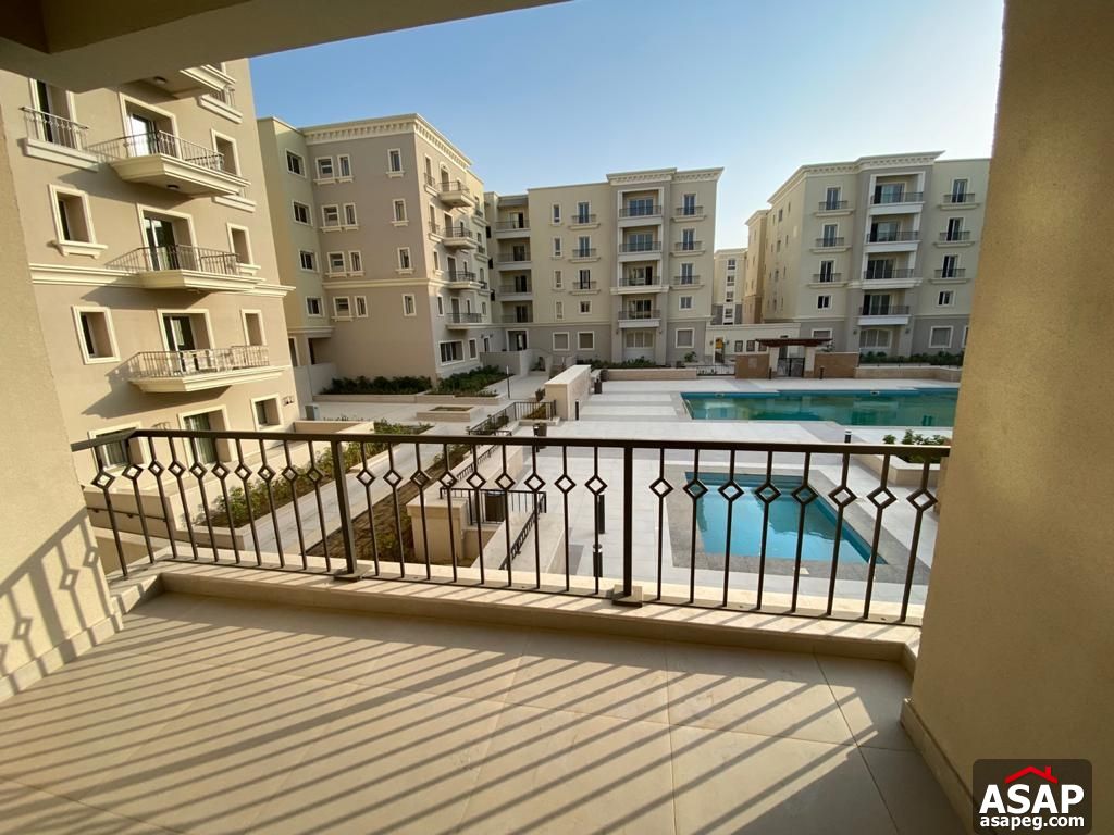 Apartment with Pool View for Rent in Mivida Compound Apartment with Pool View for Rent in Mivida Compound