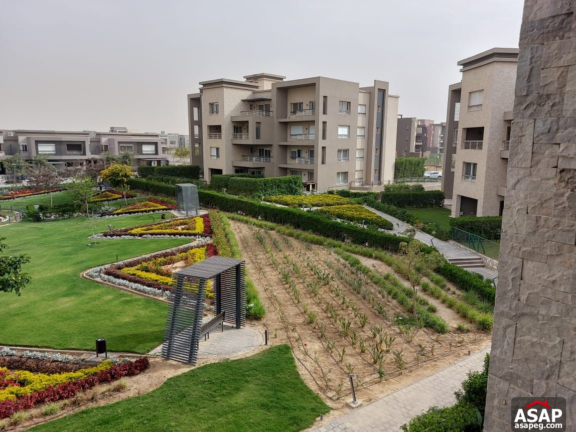 Apartment with Landscape for Rent in New Giza Compound Apartment with Landscape for Rent in New Giza Compound