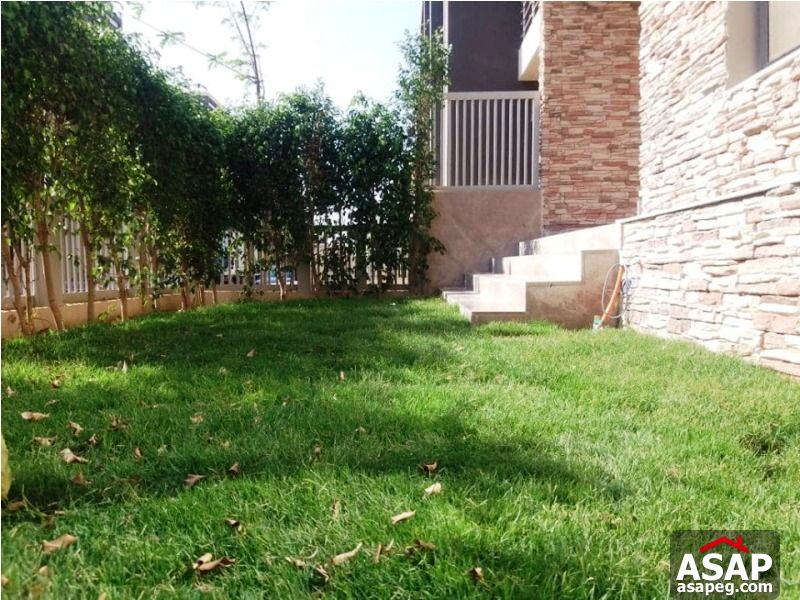 Apartment with Garden in Midtown - New Cairo Apartment with Garden in Midtown - New Cairo