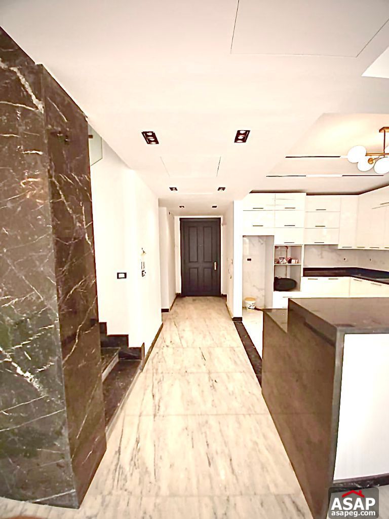 Town House with Swimming Pool for Rent in Mivida Compound Town House with Swimming Pool for Rent in Mivida Compound