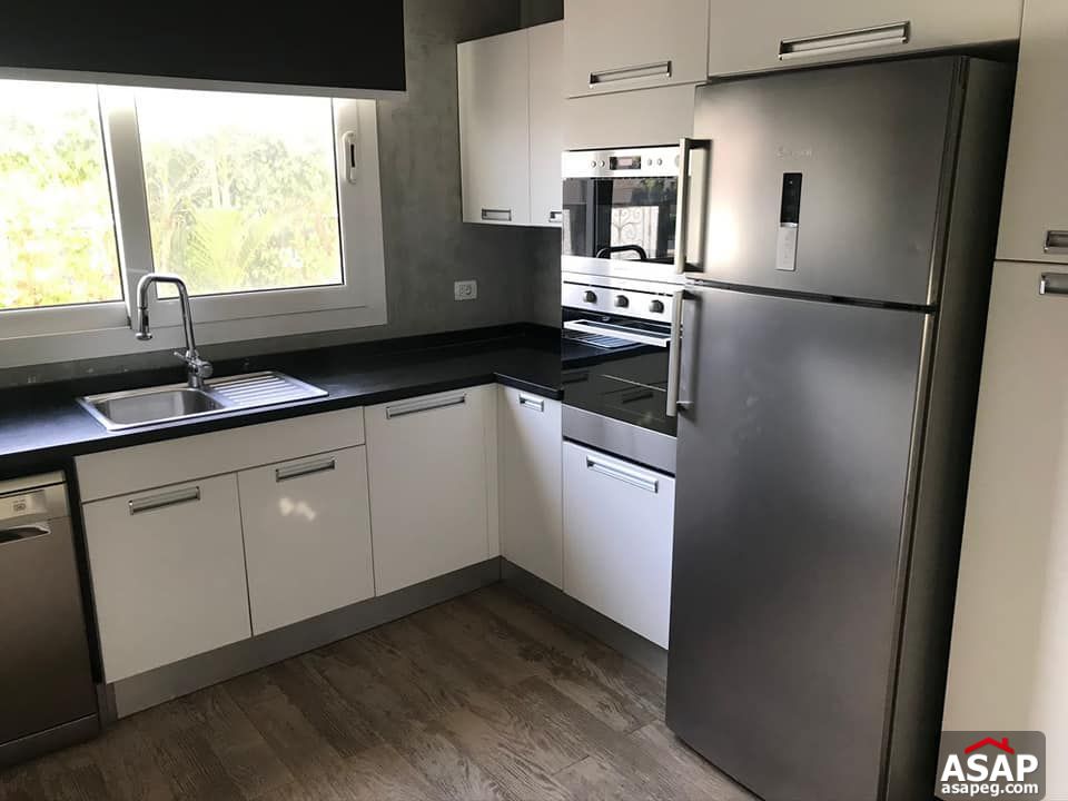 Villa with Big Garden for Rent in Mivida Villa with Big Garden for Rent in Mivida