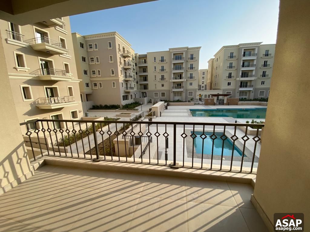 Apartment with Pool View for Rent in Mivida Compound Apartment with Pool View for Rent in Mivida Compound