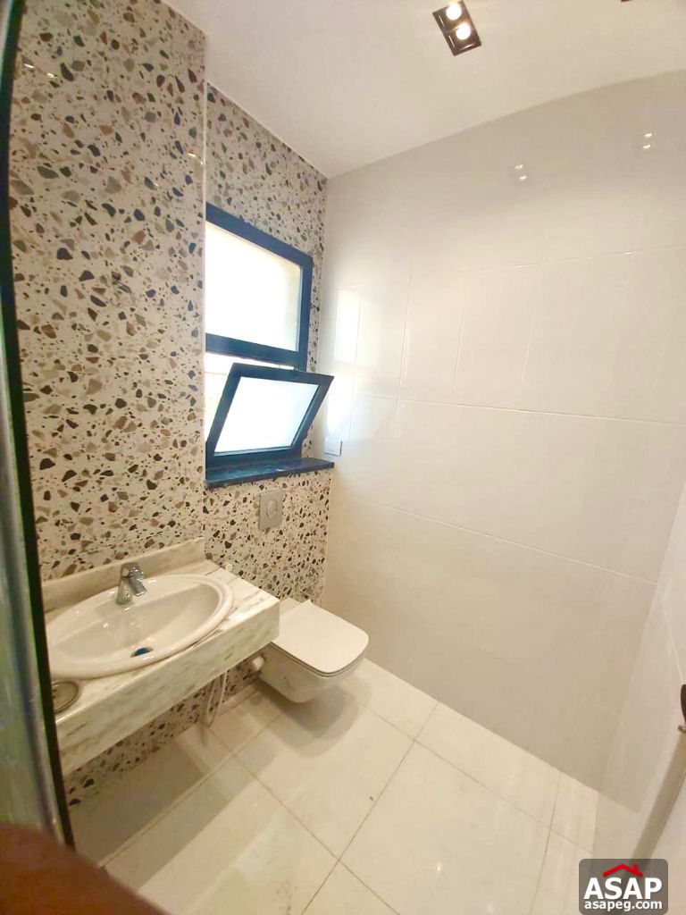 Town House with Swimming Pool for Rent in Mivida Compound Town House with Swimming Pool for Rent in Mivida Compound