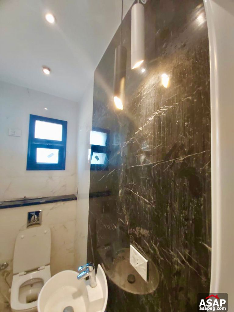 Town House with Swimming Pool for Rent in Mivida Compound Town House with Swimming Pool for Rent in Mivida Compound