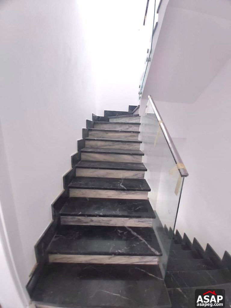 Town House with Swimming Pool for Rent in Mivida Compound Town House with Swimming Pool for Rent in Mivida Compound