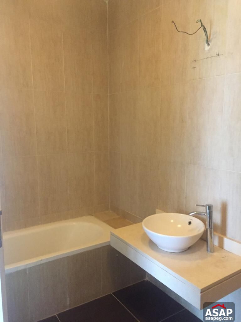 Apartment with Private Garden in The Village Palm Hills