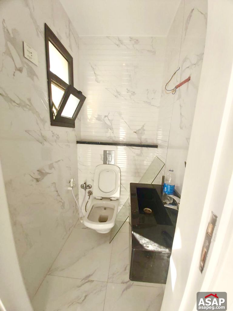 Town House with Swimming Pool for Rent in Mivida Compound Town House with Swimming Pool for Rent in Mivida Compound