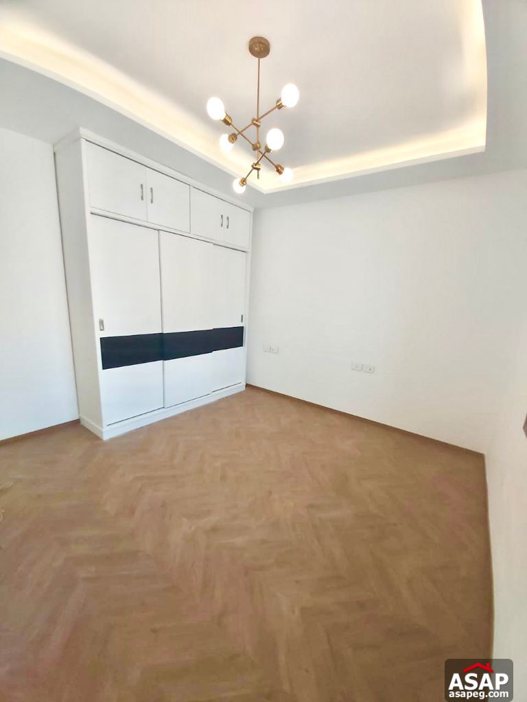 Town House with Swimming Pool for Rent in Mivida Compound Town House with Swimming Pool for Rent in Mivida Compound