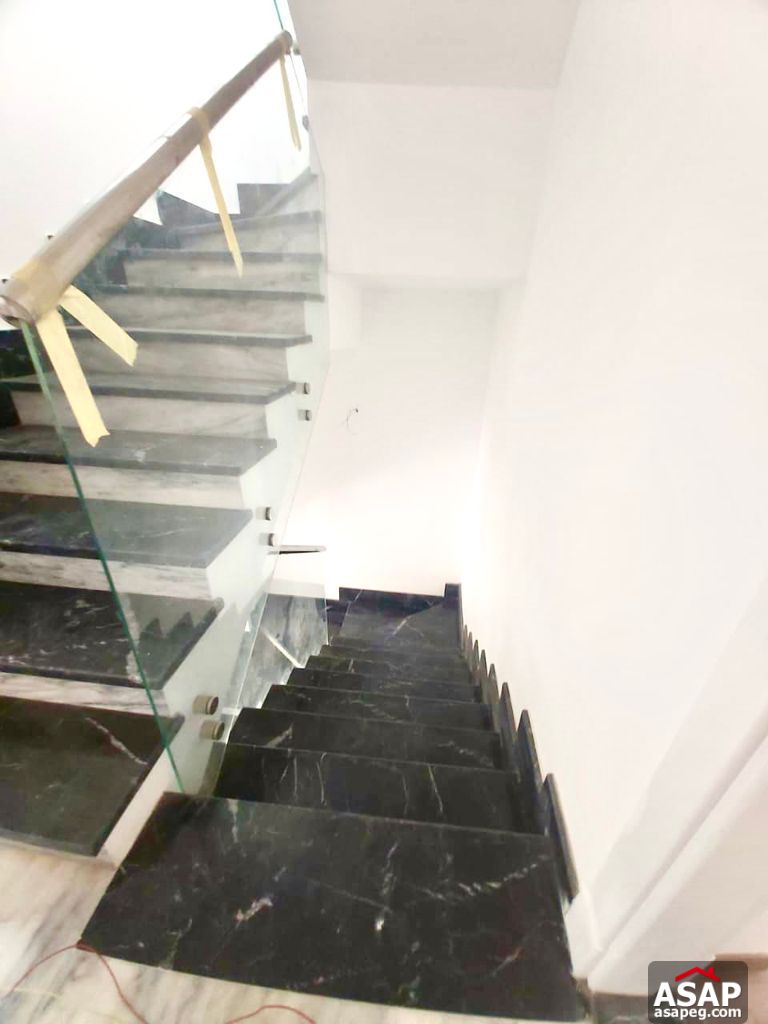 Town House with Swimming Pool for Rent in Mivida Compound Town House with Swimming Pool for Rent in Mivida Compound