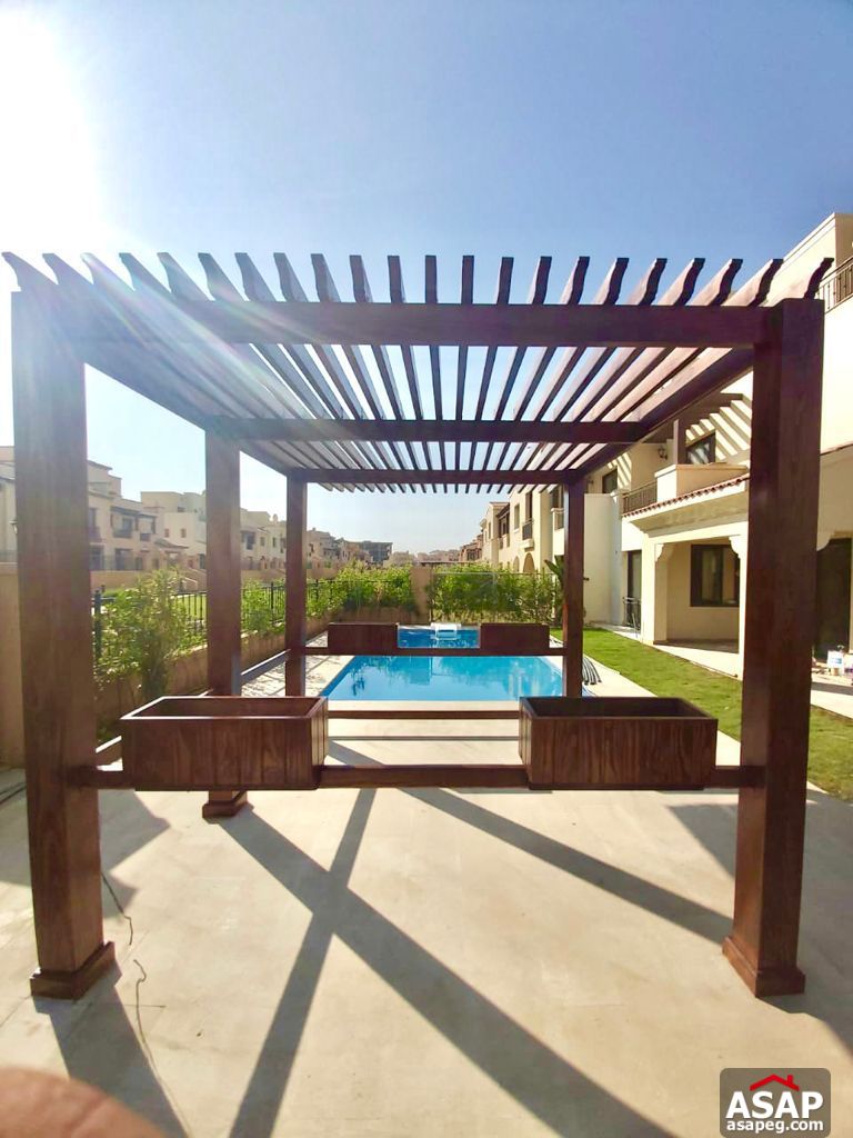 Town House with Swimming Pool for Rent in Mivida Compound Town House with Swimming Pool for Rent in Mivida Compound