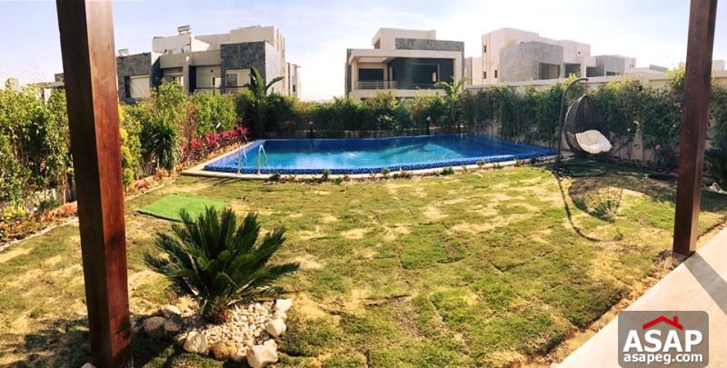 Twin House with Pool for Sale in Karma 4 - Sheikh Zayed Twin House with Pool for Sale in Karma 4 - Sheikh Zayed