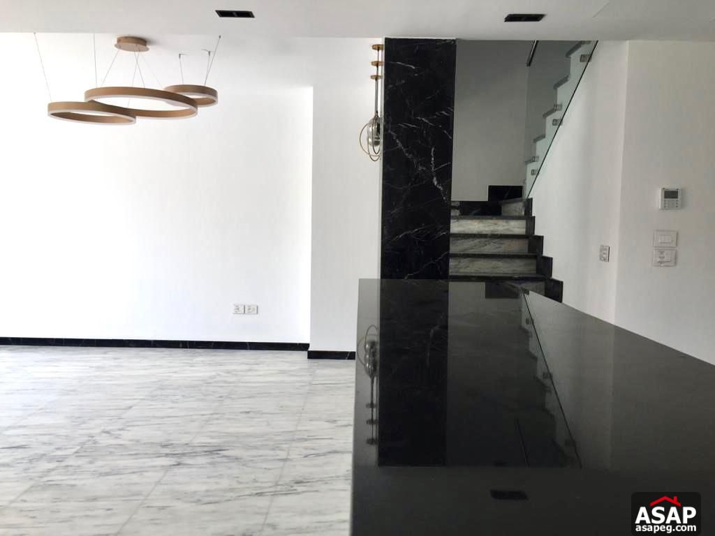 Town House with Swimming Pool for Rent in Mivida Compound Town House with Swimming Pool for Rent in Mivida Compound