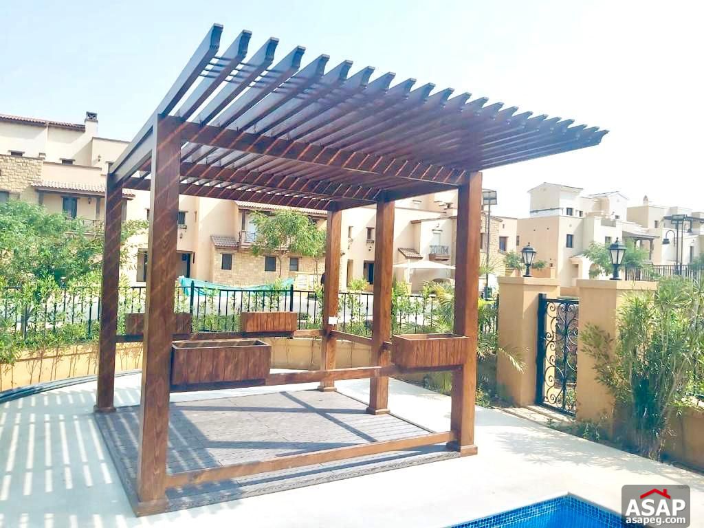 Town House with Swimming Pool for Rent in Mivida Compound Town House with Swimming Pool for Rent in Mivida Compound