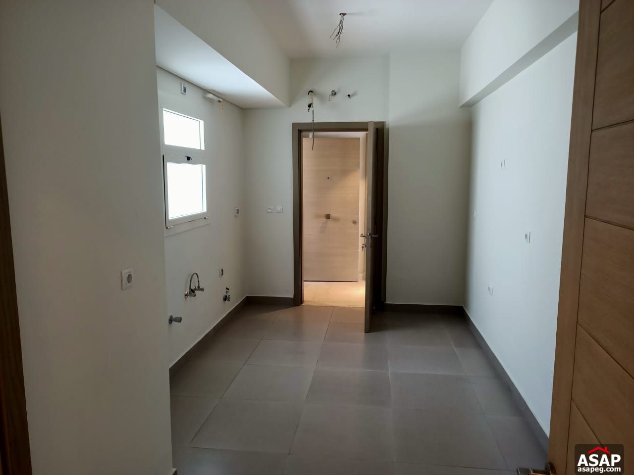 Semi Furnished Apartment for Rent in Mivida Semi Furnished Apartment for Rent in Mivida