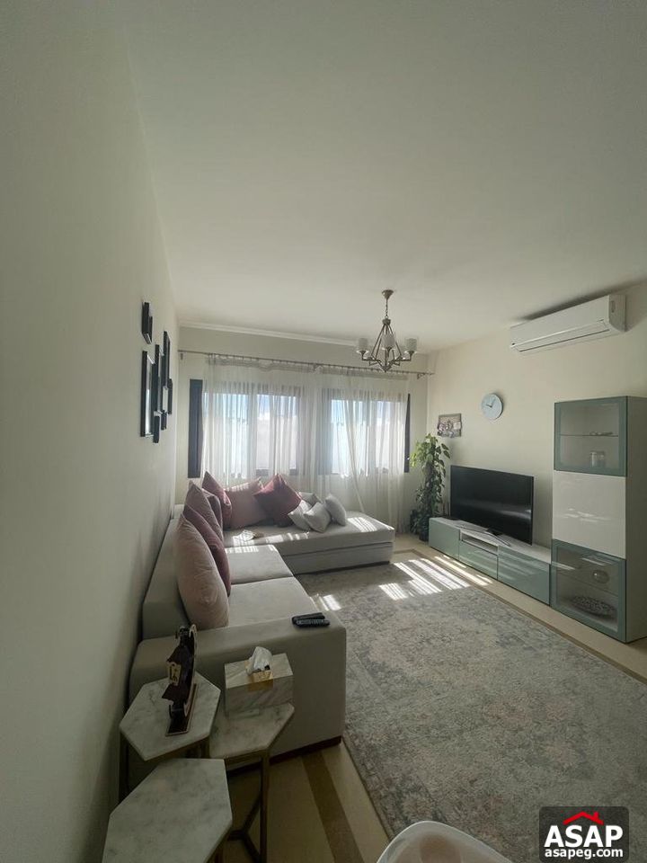 Semi Furnished Apartment for Rent in Mivida Compound Semi Furnished Apartment for Rent in Mivida Compound